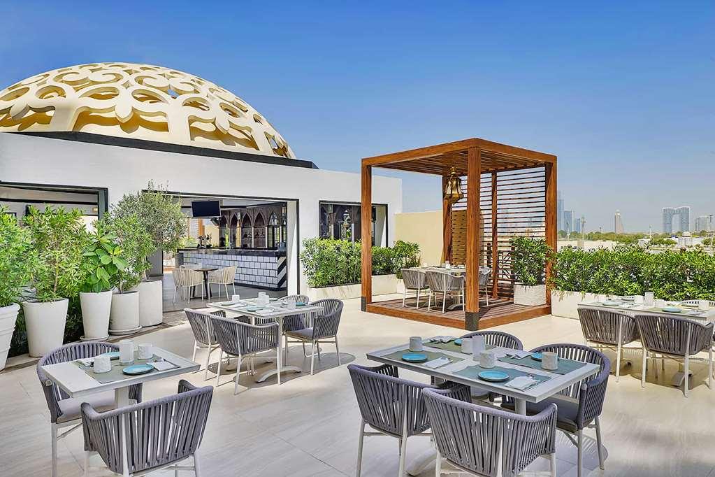 Отель Occidental Al Jaddaf, Дубай Ресторан фото